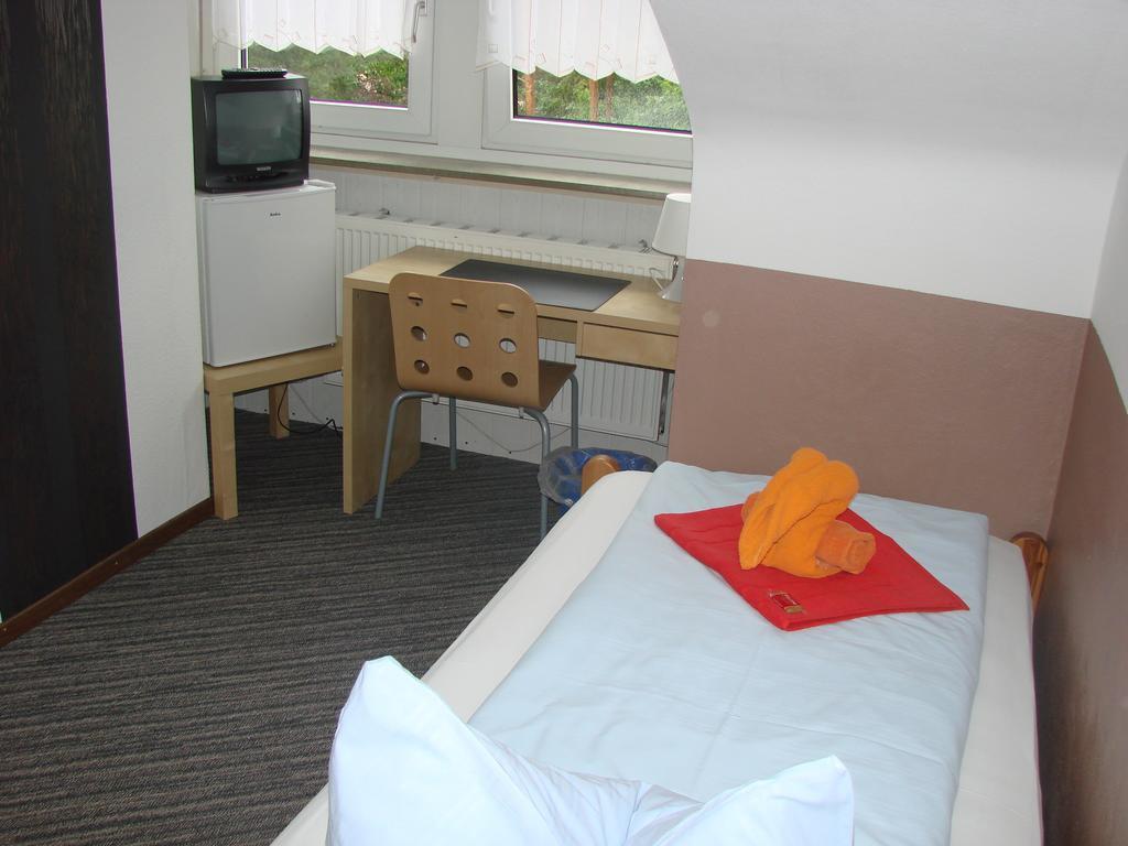 Gaestehaus Am Heuss-Platz Эрланген Номер фото